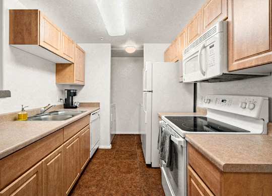 Kitchen, Refrigerator, Stove, Dishwasher, Sink, Laundry