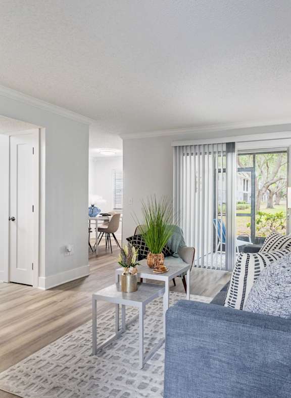 a bedroom with a bed and a ceiling fan