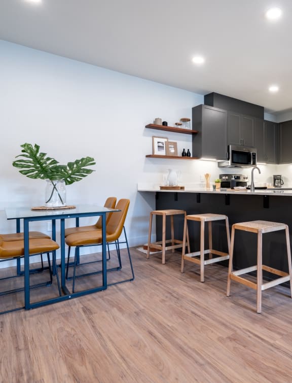 Sonder Fields Apartments Model Kitchen and Dining Area with Laundry Closet