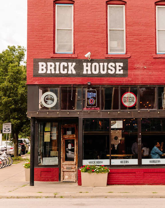 A red building with the name Brick House on it.