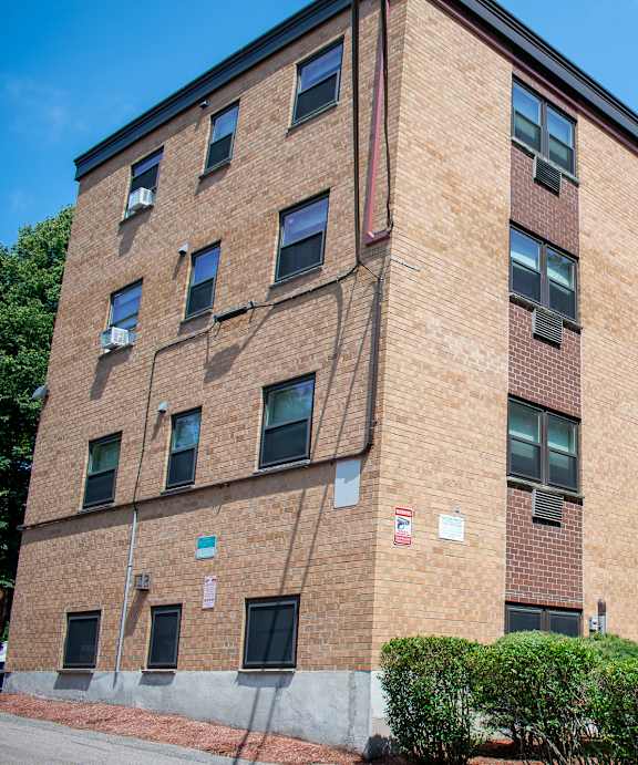our apartments are located in a brick building with ample parking