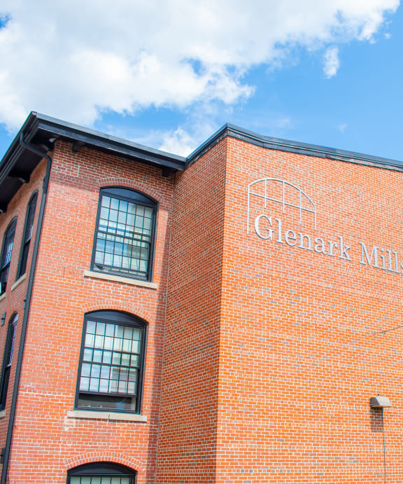 a brick building with a sign that reads glendale heights on the side