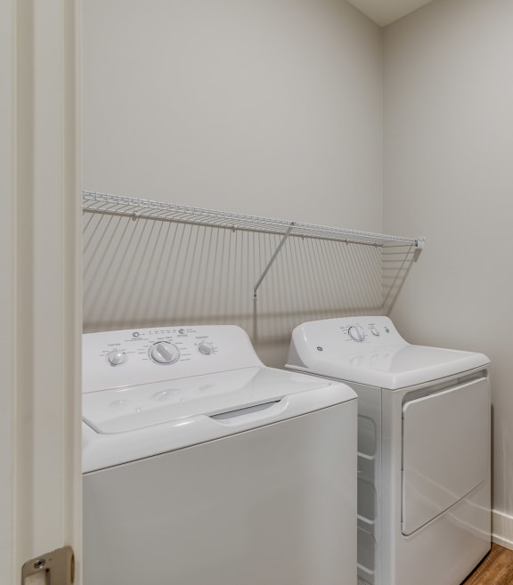 Washer dryer in home at Quarry Apartments and Townhomes in DeWitt, Michigan