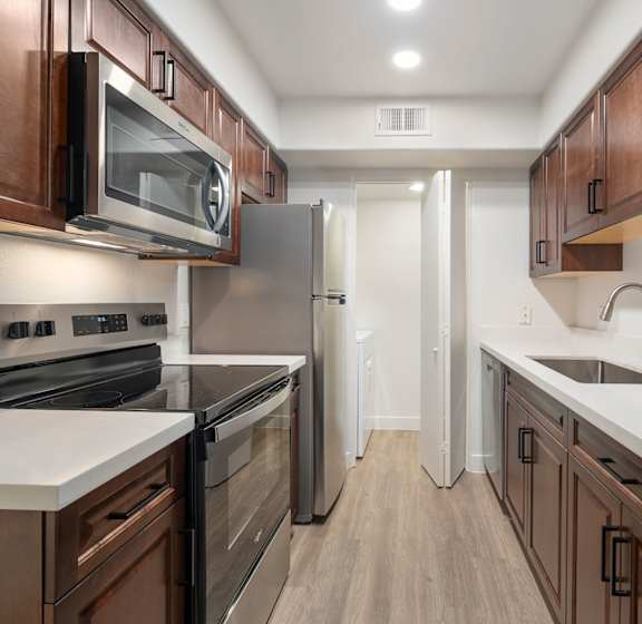 A Kitchen With White Fridge at The Summit at Flagstaff, Flagstaff, AZ, 86004