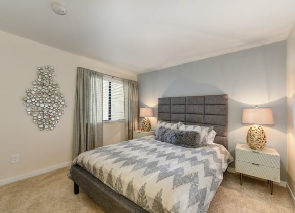 Bedroom with Window at Rush River Apartments, Sacramento, California