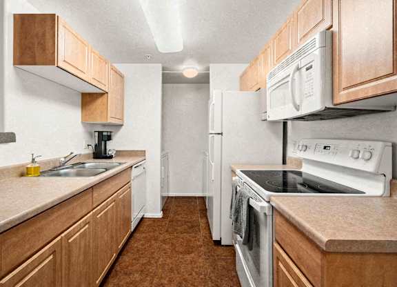 Kitchen, Refrigerator, Stove, Dishwasher, Sink, Laundry
