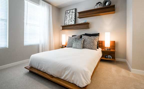 Santa Clara CA Luxury Apartments-Spacious Bedroom With Cozy Carpets, Modern Features, and Large Windows for Natural Light In The Apartment
