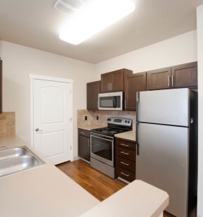 Fully Equipped Kitchen at Quadrangle 2 Apartments, Spokane