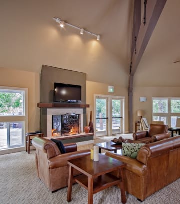 Clermont Apartments Clubhouse with Fireplace