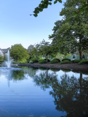 a fountain in the middle of a body of water