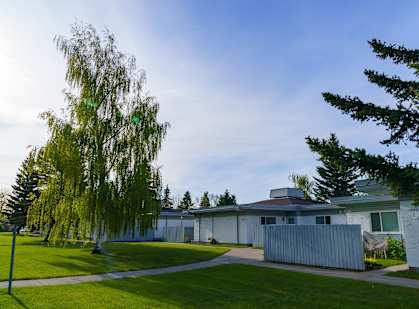 a row of mobile homes in a mobile home park