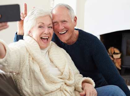 a man and woman sitting on a couch