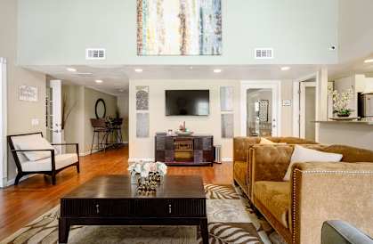 a living room with a couch and a coffee table at Sagewood Gardens Senior Apartments, Hacienda Heights California