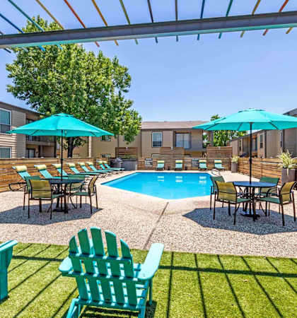 our apartments have a large pool and lounge chairs
