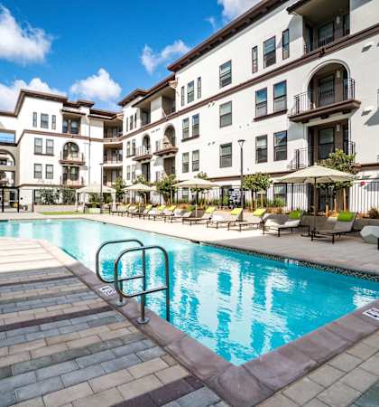Apartments Santa Clara -Villas on the Boulevard Resort Style Pool With Poolside Lounge Chairs