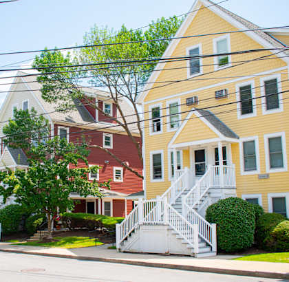 a row of colorful houses on a street