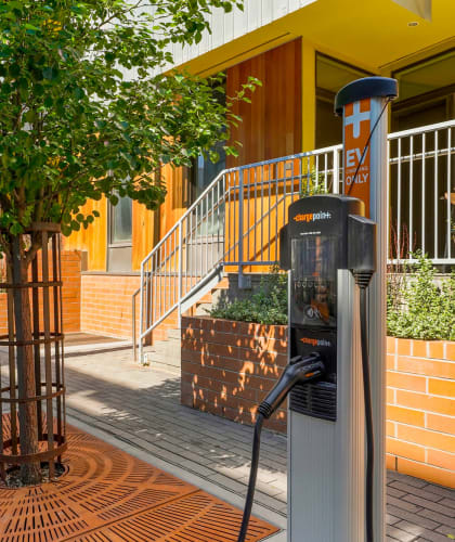 an electric car charger in front of a building