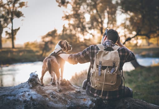 stock image- man outdoors with pet