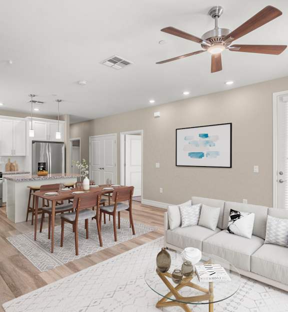 Kitchen and living room at Bella Victoria Luxury Apartments in Mesa AZ