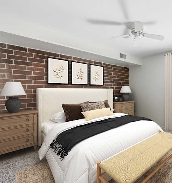 A bedroom with a brick wall, a bed, a chair, and a ceiling fan.