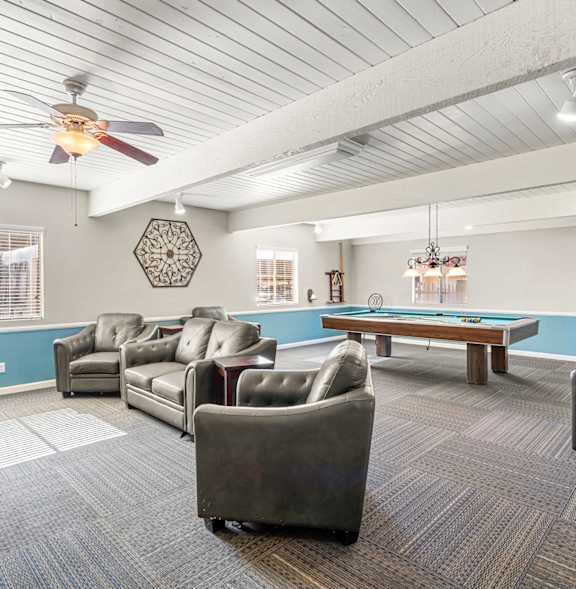 A gym with treadmills, a bench, and a weight machine.
