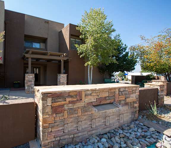 Exterior and landscaping at Villas de la Terraza Apartments in Albuquerque NM