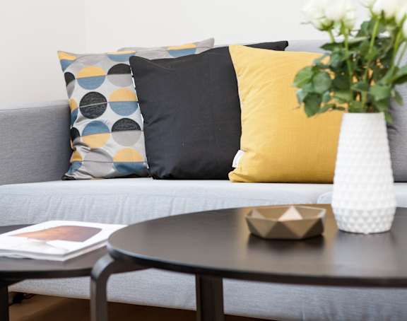 Yellow Gray Couch at Rio Verde Apartments, Arizona