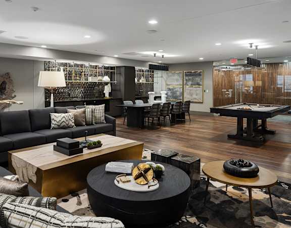 a living room with couches and tables and a pool table at Preston Centre, Columbus, Ohio, 43215