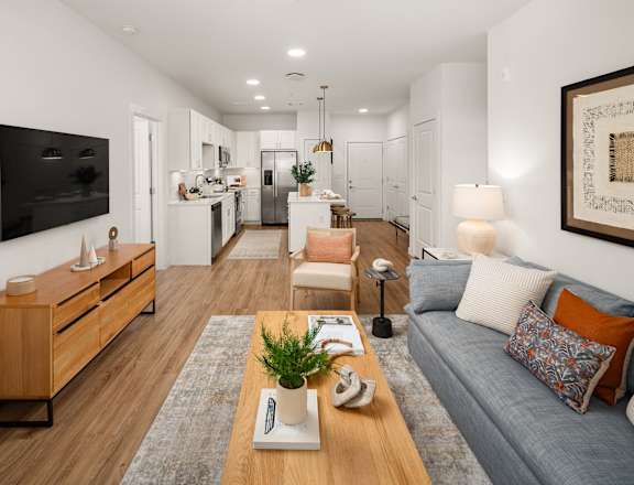 a living room with a couch and a table