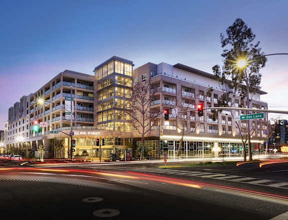 Park on First Apartments Building Exterior and Street Corner at Night