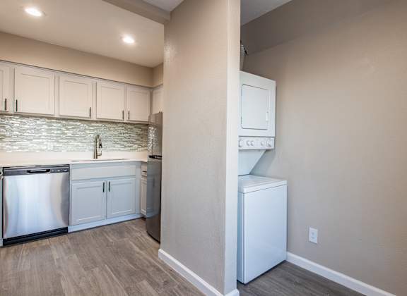 A kitchen with a white dishwasher and a white refrigerator at Sofia Apartments, Tempe, AZ, 85283
