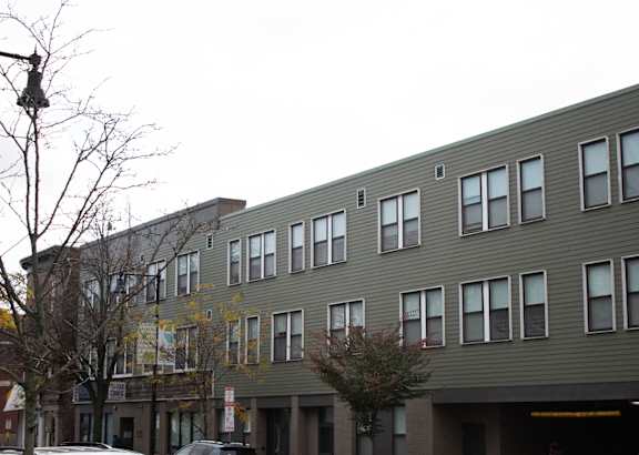 a large apartment building on a city street