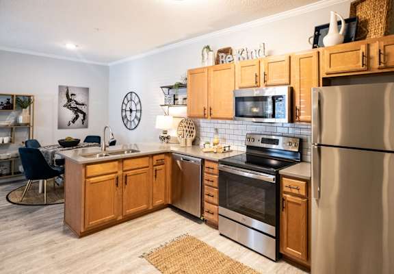 Spacious kitchen with stainless steel appliances at Grand Island Apartments in Memphis TN 38103