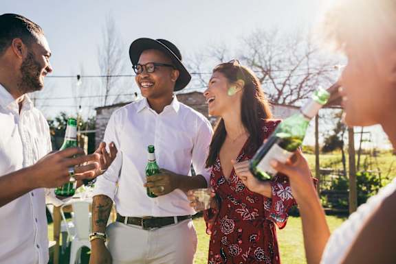 a group of people talking and holding bottles of beer at South Falls Tower, Richmond, VA, 23224