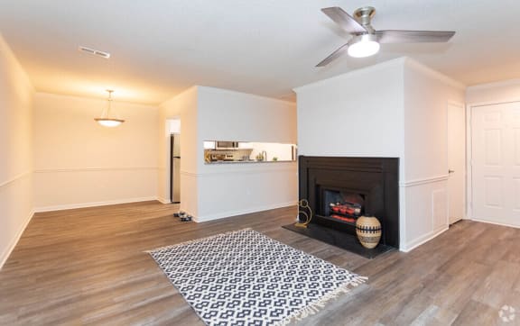 an empty kitchen with wood cabinets and stainless steel appliances