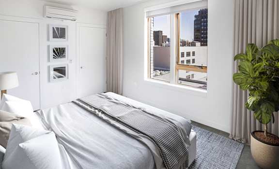 Bedroom with a bed and a window