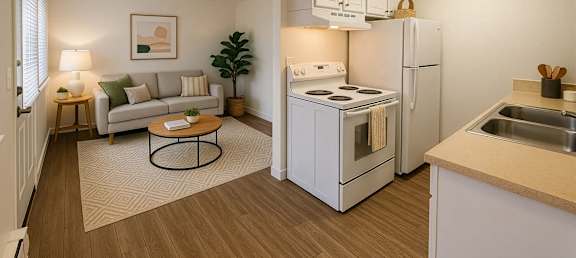 A small kitchen with a white refrigerator and a white stove top oven.