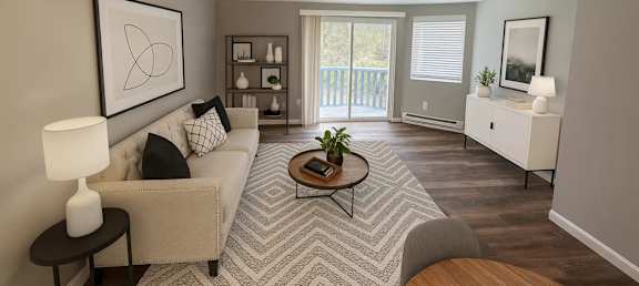 A living room with a beige couch, a coffee table, and a ceiling fan.