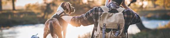 stock image- man outdoors with pet