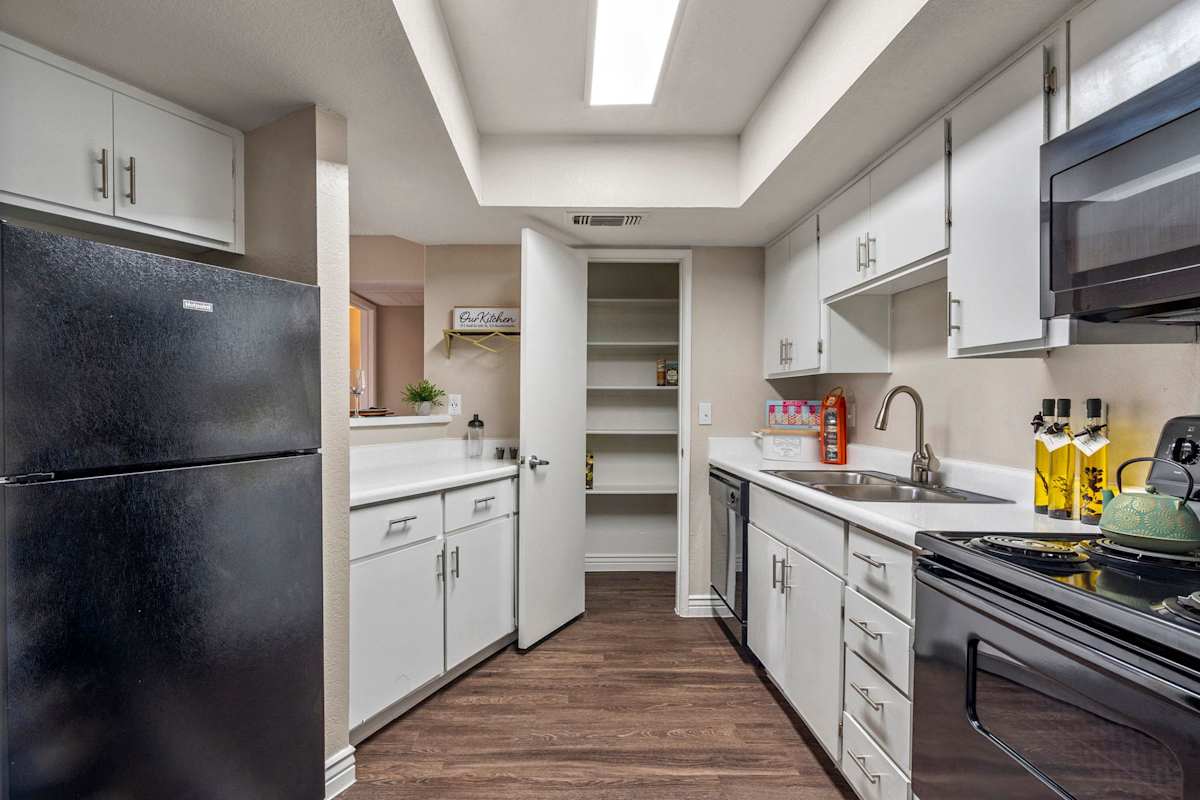 Apartment kitchen — representative home at The Place at Wickertree.
