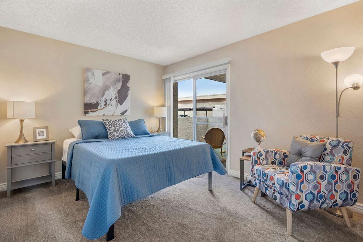 Furnished bedroom shown — representative home at The Place at Wickertree.