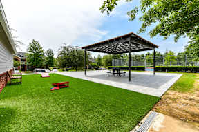 A park with a pavilion and picnic tables. at Park at Forest Hill Apartments, Memphis, Tennessee