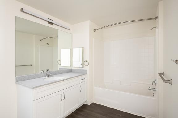 a bathroom with a sink and a shower