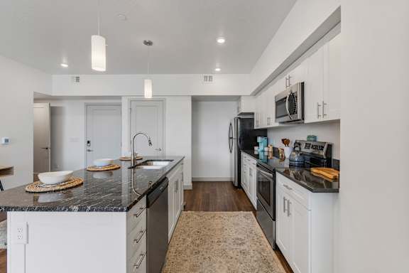 Kitchen with black stove at City View St. George, Utah, 84770