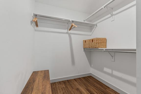 Walk in closet with white walls and wooden floor at City View St. George, Utah, 84770