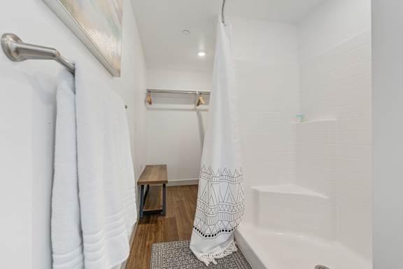 Walk-in shower with curtain at City View St. George, St. George, UT, 84770