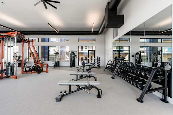 Benches, weights and modern equipment in gym at The Vue At Desert Color, Utah
