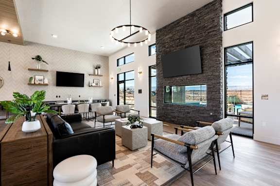Modern living room with fireplace at The Vue At Desert Color, Utah, 84790