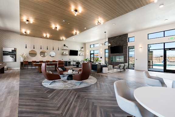 Modern living area with seating at The Vue At Desert Color, St. George, UT, 84790