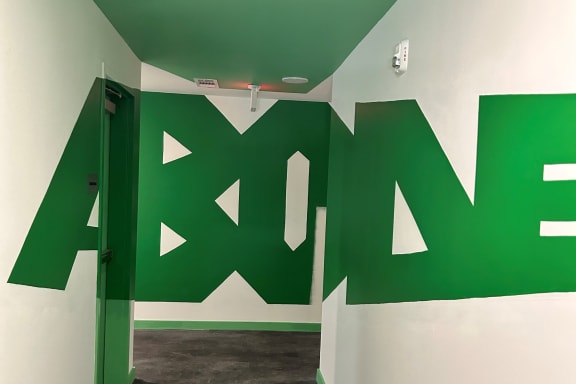 Green Wall Writing at Citizen Birmingham micro-apartments